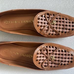 Tory Burch two-tone woven leather loafer, signature gold tone charm
